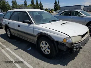1998 Subaru Legacy Outback with VIN 4S3BG6857W7656879, listed as a Copart auction lot 53478125 with 272,771 mi miles and Salvage title. Bid and sale history available at DreamBid. Image 4.
