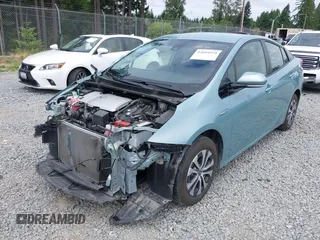2020 Toyota Prius LE with VIN JTDL9RFU1L3017670, listed as a IAAI auction lot 42694974 with 69,298 mi miles and . Bid and sale history available at DreamBid. Image 18.