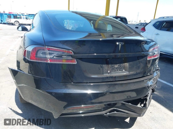 2021 Tesla Model S Long Range z VIN 5YJSA1E54MF429360, wystawiony jako IAAI lot #42662440 z przebiegiem 36 395 mil mil oraz . Historia ofert i sprzedaży dostępna na DreamBid. Obrazek 6.