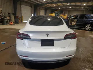 2021 Tesla Model 3 Standard Range Plus with VIN 5YJ3E1EA5MF987000, listed as a Copart auction lot 87638485 with Not Provided miles and Salvage Title. Bid and sale history available at DreamBid. Image 6.