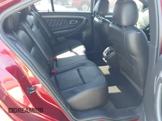 2014 Ford Taurus SEL with VIN 1FAHP2E86EG186642, listed as a IAAI auction lot 41901768 with 106,057 mi miles. Bid and sale history available at carsss.com. Image 8.