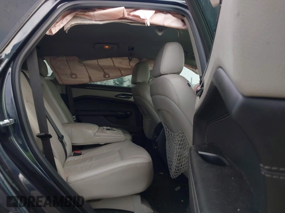 2014 Cadillac SRX with VIN 3GYFNAE38ES659362, listed as a IAAI auction lot 41971537 with 115,379 mi miles and . Bid and sale history available at DreamBid. Image 8.