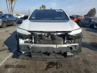 2024 Toyota bZ4X XLE with VIN JTMABACA6RA065029, listed as a Copart auction lot 43008655 with 15,489 mi miles and Salvage Title. Bid and sale history available at DreamBid. Image 5.