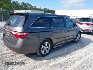 2012 Honda Odyssey Touring с VIN 5FNRL5H93CB133288, выставлен на аукционе IAAI как лот 42020622 с пробегом 184 077 миль миль и . История ставок и продаж доступна на DreamBid. Изображение 4.