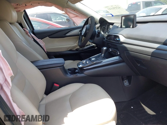 2016 Mazda CX-9 Touring with VIN JM3TCACY7G0101632, listed as a IAAI auction lot 42191115 with 163,070 mi miles and . Bid and sale history available at DreamBid. Image 5.
