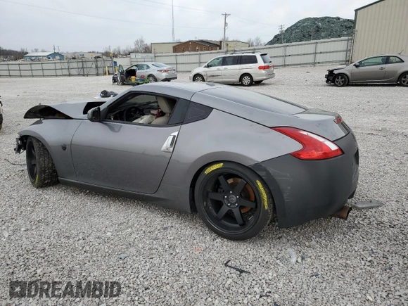 2014 Nissan 370Z Touring with VIN JN1AZ4EH8EM633901, listed as a Copart auction lot 49668815 with 0 mi miles and Salvage Title. Bid and sale history available at carsss.com. Image 2.