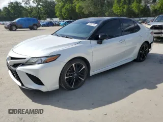 2019 Toyota Camry XSE with VIN 4T1B61HK2KU190975, listed as a Copart auction lot 51047325 with 69,453 mi miles and Salvage Title. Bid and sale history available at carsss.com. Image 1.