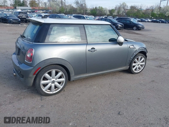 2008 MINI Hardtop S with VIN WMWMF73558TT87605, listed as a IAAI auction lot 41940226 with 113,595 mi miles and . Bid and sale history available at DreamBid. Image 4.