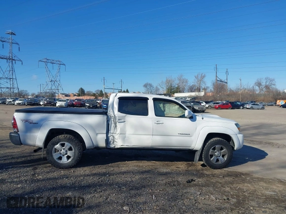 2009 Toyota Tacoma z VIN 5TEMU52N99Z621200, wystawiony jako IAAI lot #41318515 z przebiegiem 157 034 mil mil oraz . Historia ofert i sprzedaży dostępna na DreamBid. Obrazek 13.