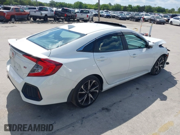 2018 Honda Civic Si with VIN 2HGFC1E53JH700251, listed as a IAAI auction lot 42043732 with 104,763 mi miles and . Bid and sale history available at DreamBid. Image 4.