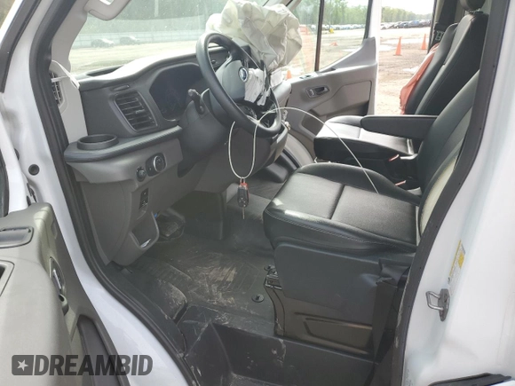 2023 Ford Transit Cargo with VIN 1FTBR2C84PKB15484, listed as a Copart auction lot 50737605 with 15,881 mi miles and Salvage title. Bid and sale history available at DreamBid. Image 7.
