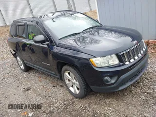 2011 Jeep Compass Latitude with VIN 1J4NT1FB8BD194438, listed as a IAAI auction lot 42130688 with 186,257 mi miles. Bid and sale history available at carsss.com. Image 1.
