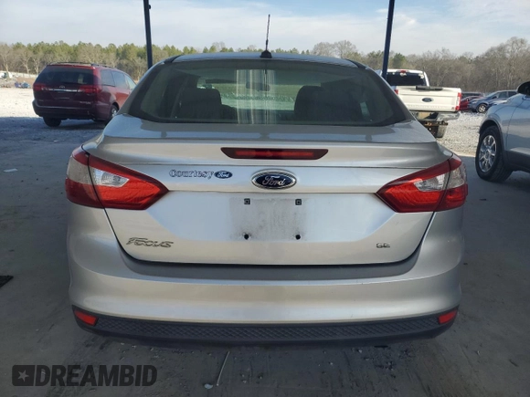 2013 Ford Focus SE z VIN 1FADP3F26DL217215, wystawiony jako Copart lot #46601875 z przebiegiem 167 160 mil mil oraz Szkoda całkowita • Salvage title. Historia ofert i sprzedaży dostępna na DreamBid. Obrazek 6.