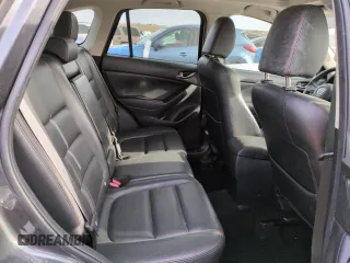 2015 Mazda CX-5 Grand Touring with VIN JM3KE4DY3F0495411, listed as a Copart auction lot 50077765 with 136,191 mi miles and Salvage Title. Bid and sale history available at DreamBid. Image 10.