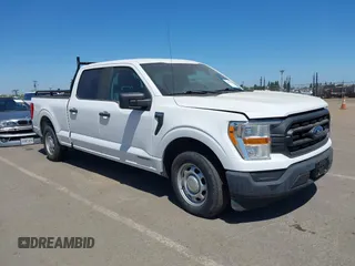 2021 Ford F-150 XL with VIN 1FTFW1CD1MFB31373, listed as a IAAI auction lot 42530409 with 119,956 mi miles and . Bid and sale history available at DreamBid. Image 1.