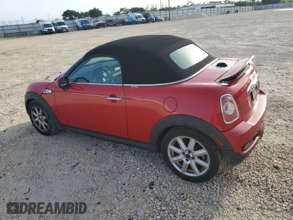 2013 MINI Roadster S z VIN WMWSY3C56DT593875, wystawiony jako Copart lot #74982124 z przebiegiem 64 622 mil mil oraz Szkody całkowita. Historia ofert i sprzedaży dostępna na DreamBid. Obrazek 2.
