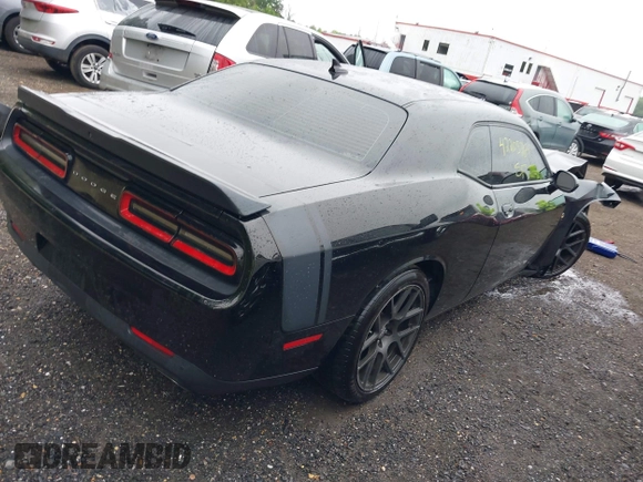 2016 Dodge Challenger R/T Scat Pack with VIN 2C3CDZFJ1GH265333, listed as a IAAI auction lot 42205764 with 68,195 mi miles and . Bid and sale history available at DreamBid. Image 4.