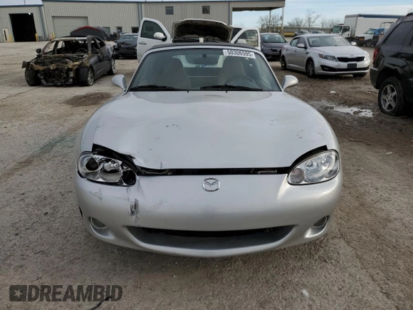 2001 Mazda MX-5 Miata with VIN JM1NB353510214097, listed as a Copart auction lot 50306595 with 111,359 mi miles and Salvage Title. Bid and sale history available at DreamBid. Image 5.