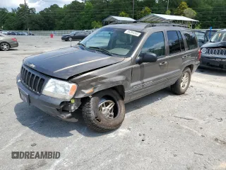 1999 Jeep Grand Cherokee Limited with VIN 1J4GW68S6XC713297, listed as a Copart auction lot 55264384 with 98,912 mi miles and Salvage Title. Bid and sale history available at carsss.com. Image 1.