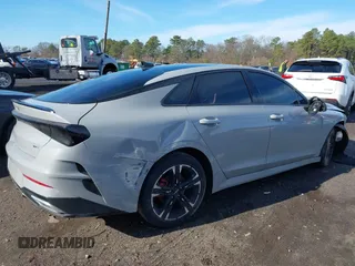 2023 Kia K5 GT-Line z VIN 5XXG64J28PG188506, wystawiony jako IAAI lot #41854184 z przebiegiem 18 967 mil mil oraz . Historia ofert i sprzedaży dostępna na DreamBid. Obrazek 4.