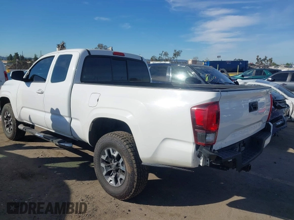 2018 Toyota Tacoma SR with VIN 5TFRX5GN9JX106232, listed as a IAAI auction lot 41634120 with 66,674 mi miles and . Bid and sale history available at DreamBid. Image 3.