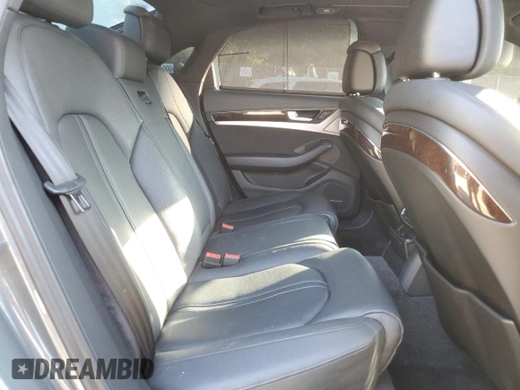 2015 Audi A8 with VIN WAUJGAFD3FN013026, listed as a Copart auction lot 67650374 with 88,064 mi miles and Salvage title. Bid and sale history available at DreamBid. Image 10.