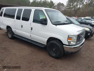 2012 Ford Econoline Wagon XL with VIN 1FBSS3BL8CDA76787, listed as a IAAI auction lot 41464917 with 386,484 mi miles. Bid and sale history available at carsss.com. Image 1.