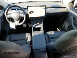 2023 Tesla Model Y Long Range with VIN 7SAYGDEE9PA180293, listed as a Copart auction lot 89062695 with 21,648 mi miles and Salvage Title. Bid and sale history available at DreamBid. Image 8.