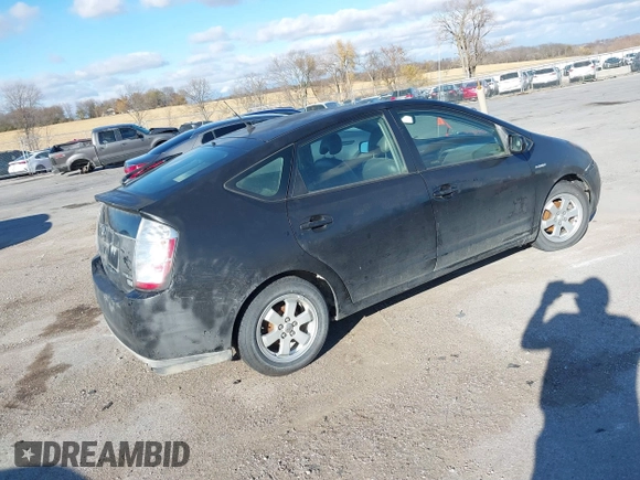 2007 Toyota Prius with VIN JTDKB20U277563120, listed as a IAAI auction lot 40736242 with 315,489 mi miles. Bid and sale history available at carsss.com. Image 4.
