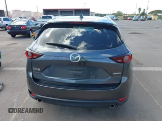 2021 Mazda CX-5 Touring with VIN JM3KFACM2M1348305, listed as a IAAI auction lot 41627199 with 30,044 mi miles. Bid and sale history available at carsss.com. Image 17.