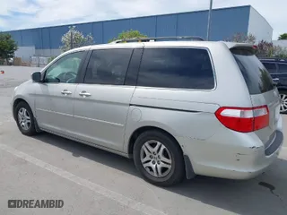 2005 Honda Odyssey EX-L with VIN 5FNRL38775B028551, listed as a IAAI auction lot 42011201 with 201,957 mi miles. Bid and sale history available at carsss.com. Image 3.