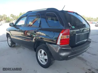 2007 Kia Sportage LX with VIN KNDJF724877450962, listed as a IAAI auction lot 41918290 with 216,476 mi miles. Bid and sale history available at carsss.com. Image 3.