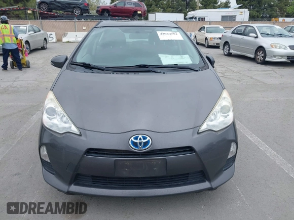 2014 Toyota Prius One with VIN JTDKDTB37E1564963, listed as a IAAI auction lot 42054591 with 186,680 mi miles and . Bid and sale history available at DreamBid. Image 12.
