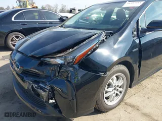 2022 Toyota Prius L Eco with VIN JTDKAMFUXN3163364, listed as a IAAI auction lot 41593914 with 43,948 mi miles. Bid and sale history available at carsss.com. Image 6.