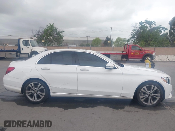 2018 Mercedes-Benz C 300 with VIN 55SWF4JB9JU235630, listed as a IAAI auction lot 42063801 with 117,855 mi miles and . Bid and sale history available at DreamBid. Image 13.