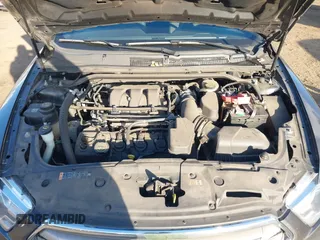 2015 Ford Taurus SEL with VIN 1FAHP2H86FG174102, listed as a IAAI auction lot 40997366 with 132,543 mi miles. Bid and sale history available at carsss.com. Image 10.