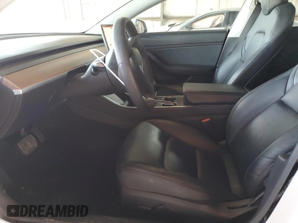 2020 Tesla Model 3 Standard Range Plus with VIN 5YJ3E1EA6LF645215, listed as a Copart auction lot 47882375 with 69,317 mi miles and Salvage Title. Bid and sale history available at DreamBid. Image 7.