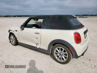 2017 MINI Convertible Cooper z VIN WMWWG5C32H3C20341, wystawiony jako Copart lot #57039685 z przebiegiem 100 575 mil mil oraz Szkoda całkowita • Salvage title. Historia ofert i sprzedaży dostępna na DreamBid. Obrazek 2.