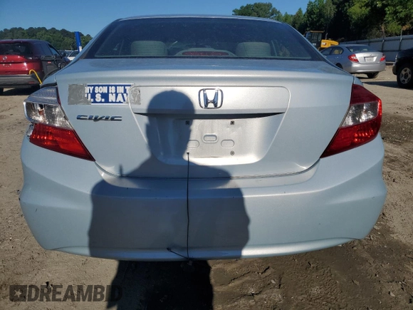 2012 Honda Civic LX z VIN 19XFB2F59CE078873, wystawiony jako Copart lot #58323605 z przebiegiem 210 080 mil mil oraz Czysty tytuł • Clean title. Historia ofert i sprzedaży dostępna na DreamBid. Obrazek 6.