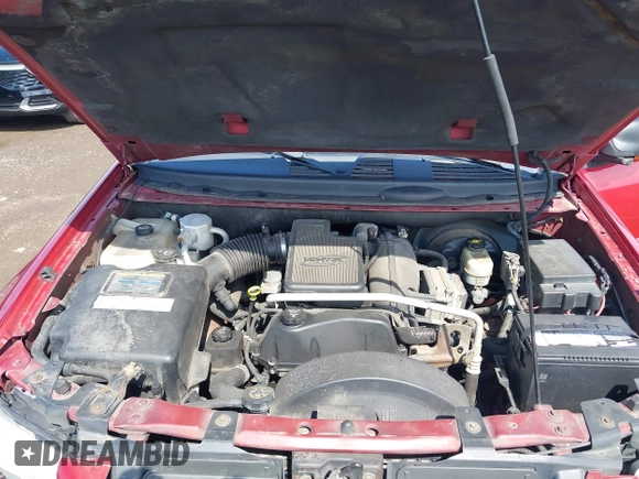 2005 GMC Envoy SLE with VIN 1GKDT13S252127604, listed as a IAAI auction lot 41898390 with 210,655 mi miles. Bid and sale history available at carsss.com. Image 10.