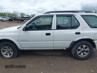 2000 Isuzu Rodeo z VIN 4S2DM58W6Y4312571, wystawiony jako IAAI lot #42253955 z przebiegiem 84 517 mil mil oraz . Historia ofert i sprzedaży dostępna na DreamBid. Obrazek 14.