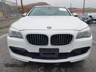 2013 BMW 7 Series 740i with VIN WBAYA6C57DC995338, listed as a IAAI auction lot 41479077 with 123,680 mi miles and . Bid and sale history available at DreamBid. Image 6.