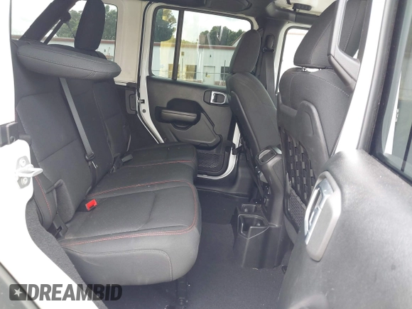 2021 Jeep Wrangler Unlimited Rubicon with VIN 1C4HJXFG7MW527498, listed as a IAAI auction lot 42393520 with 18,085 mi miles and . Bid and sale history available at DreamBid. Image 8.