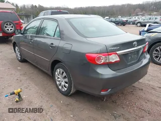 2013 Toyota Corolla L with VIN 2T1BU4EEXDC934686, listed as a IAAI auction lot 42074981 with 167,577 mi miles. Bid and sale history available at carsss.com. Image 3.