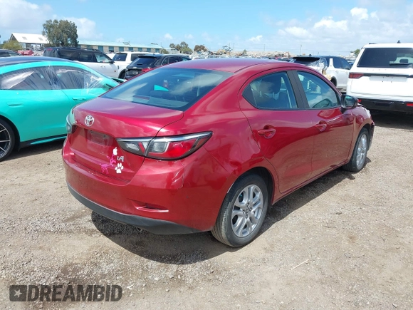 2018 Toyota Yaris with VIN 3MYDLBYV1JY301213, listed as a IAAI auction lot 41944203 with 156,641 mi miles and . Bid and sale history available at DreamBid. Image 4.