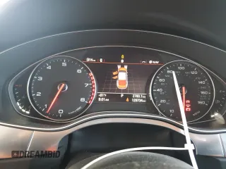 2015 Audi A7 3.0 Prestige with VIN WAU2GAFCXFN011804, listed as a Copart auction lot 67521504 with 129,734 mi miles and Salvage Title. Bid and sale history available at carsss.com. Image 9.
