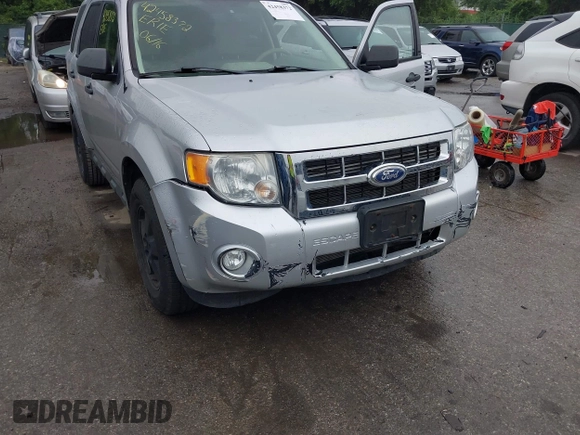 2011 Ford Escape XLT z VIN 1FMCU9DG5BKB13765, wystawiony jako IAAI lot #42458372 z przebiegiem 111 074 mil mil oraz . Historia ofert i sprzedaży dostępna na DreamBid. Obrazek 13.