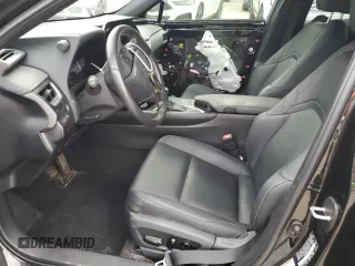 2023 Lexus UX 250h Premium с VIN JTHP6JBH8P2133821, выставлен на аукционе Copart как лот 61007355 с пробегом 32 540 миль миль и Списание • Salvage title. История ставок и продаж доступна на DreamBid. Изображение 7.