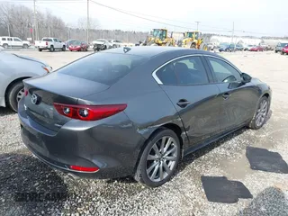 2023 Mazda 3 S Premium with VIN 3MZBPBDM8PM373434, listed as a IAAI auction lot 41234729 with 9,387 mi miles and . Bid and sale history available at DreamBid. Image 4.