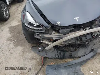 2022 Tesla Model 3 Long Range z VIN 5YJ3E1EB8NF315359, wystawiony jako IAAI lot #42035599 z przebiegiem 54 974 mil mil oraz . Historia ofert i sprzedaży dostępna na DreamBid. Obrazek 21.